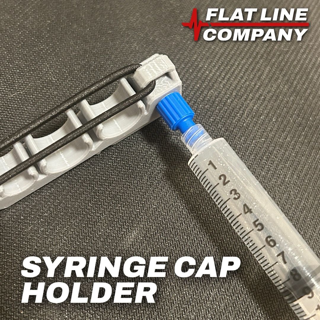 MedicMate Mini™ syringe organiser shown clipped to a medic belt