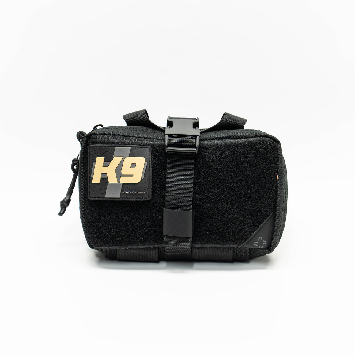 Black compact Working Dog First Aid Kit IFAK sitting on white backgound. Pouch has a velcro front panel with a black PVC patch showing contours a grey medical cross and tan text stating: K9