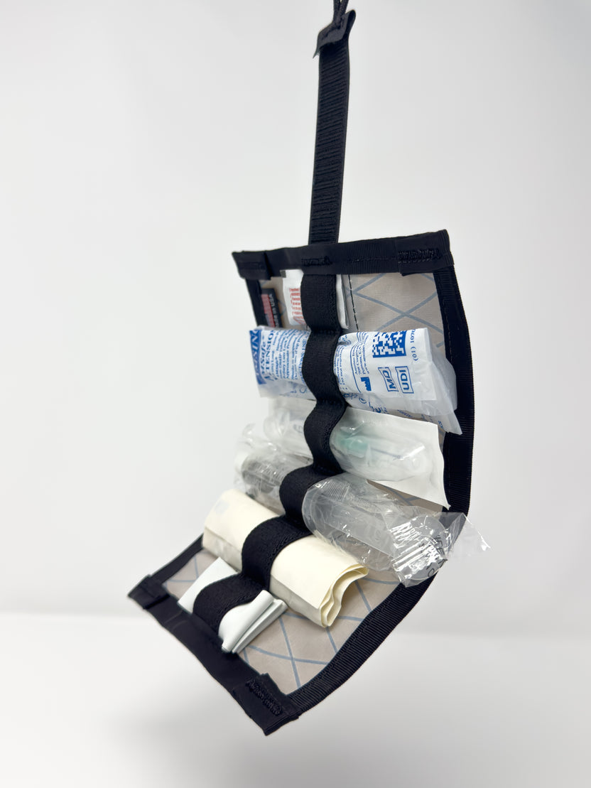MED Roll opened to display elastic loops holding medical tools in place.