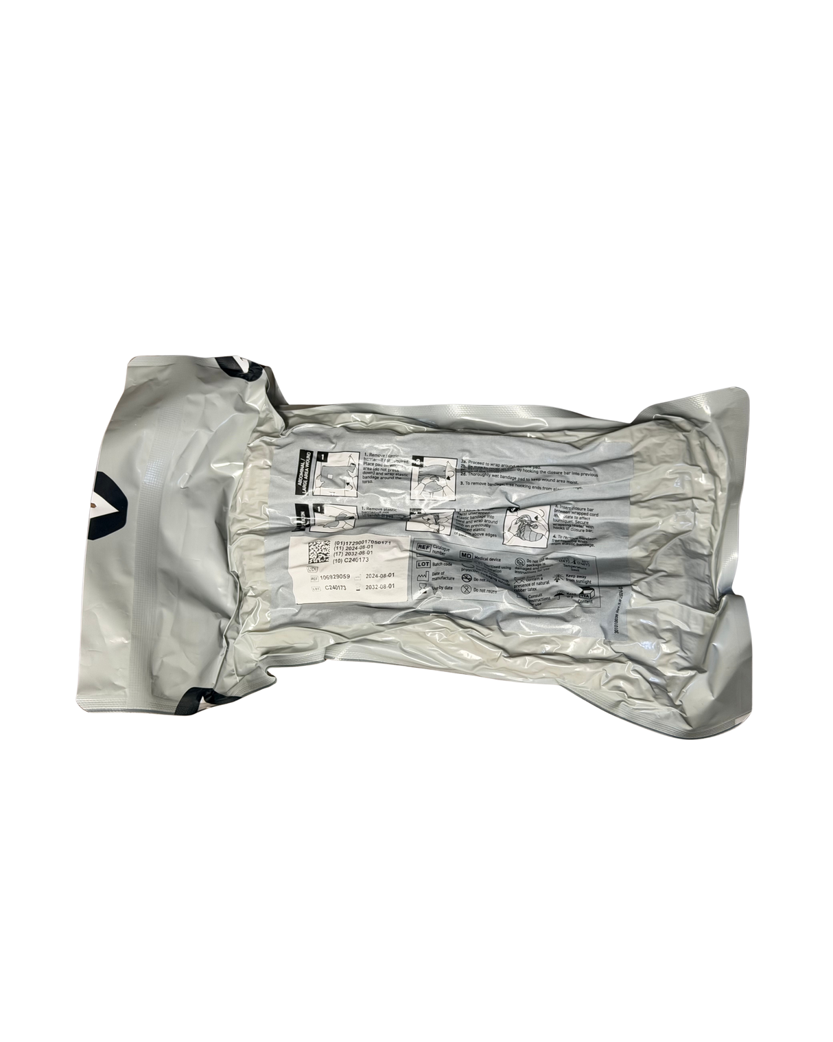 FIRSTCARE tactical trauma bandage showing pressure applicator and closure bar detail