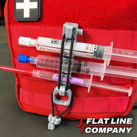 MedicMate Mini™ syringe organiser in use during medication preparation