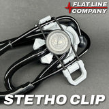STETHO-CLIP stethoscope holder clipped to a belt with stethoscope secured