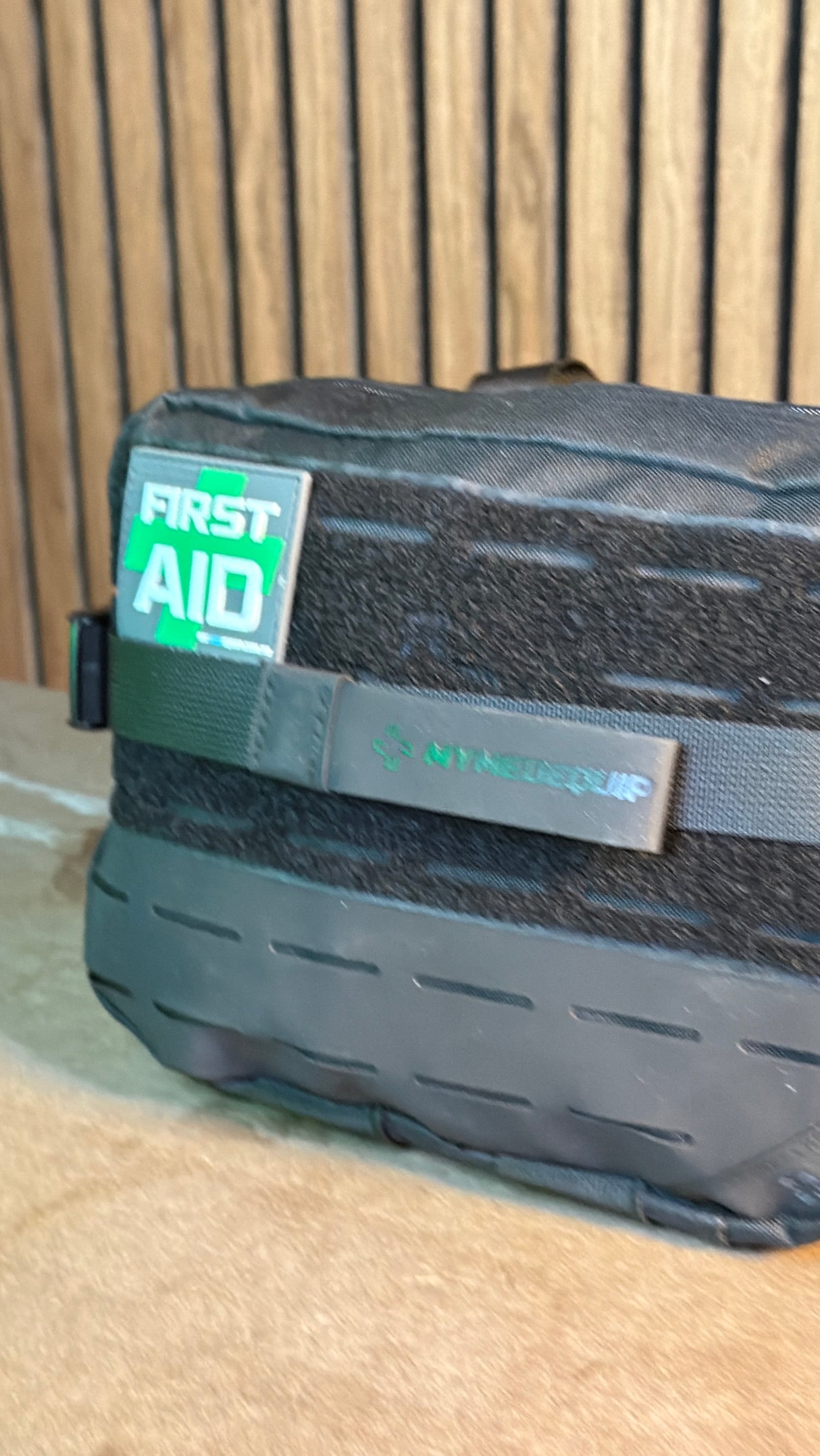 Vertex Pro Aid Pouch open, showing organised first aid supplies inside