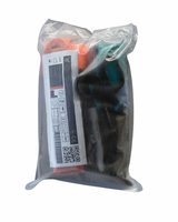 TraumaFix IFAK Refill contents laid out, tourniquet, chest seals, gauze and dressing
