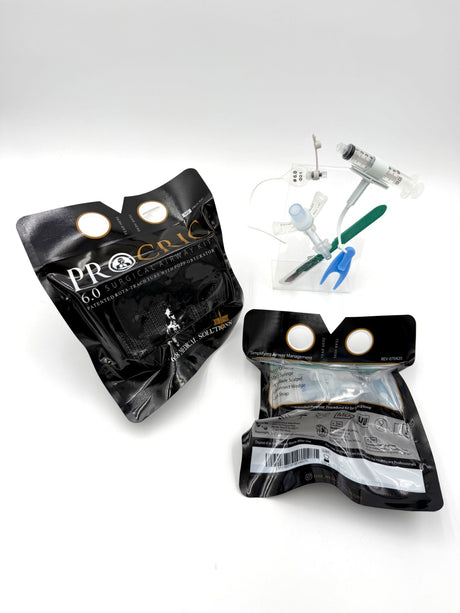 ProCric cricothyrotomy kit contents laid out - Rota-Trach tube, Popp Obturator, scalpel
